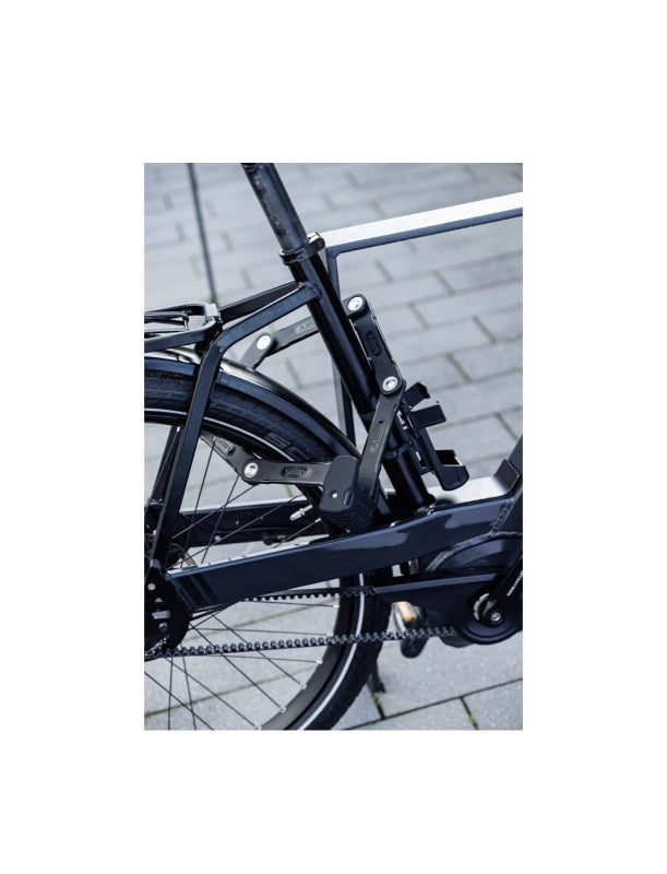 Dunkes Faltschloss ABUS Bordo Granit 6500K/120 SH am E-Bike Rahmen